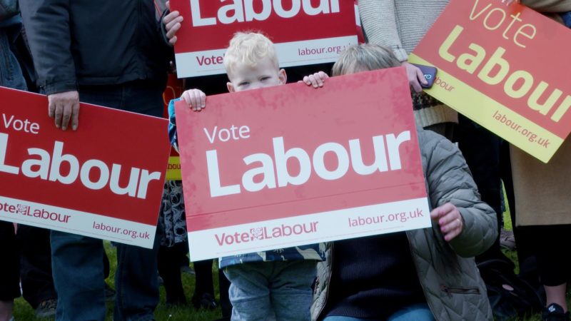 Labour campaigners holding Correx boards